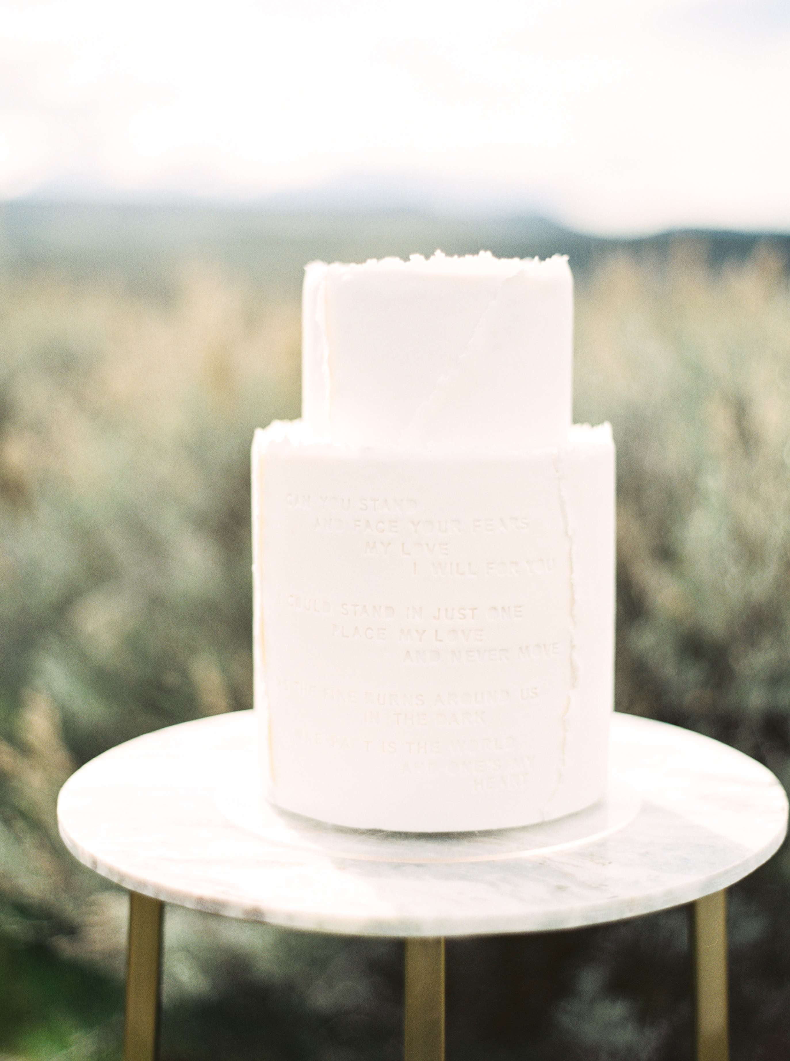 debossed wedding cake with song lyrics